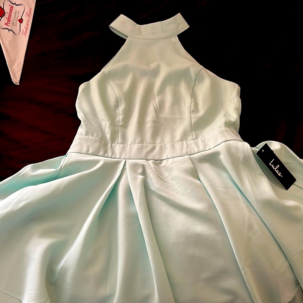 Mint green lulus skater dress. Never worn. Open back, high neck.